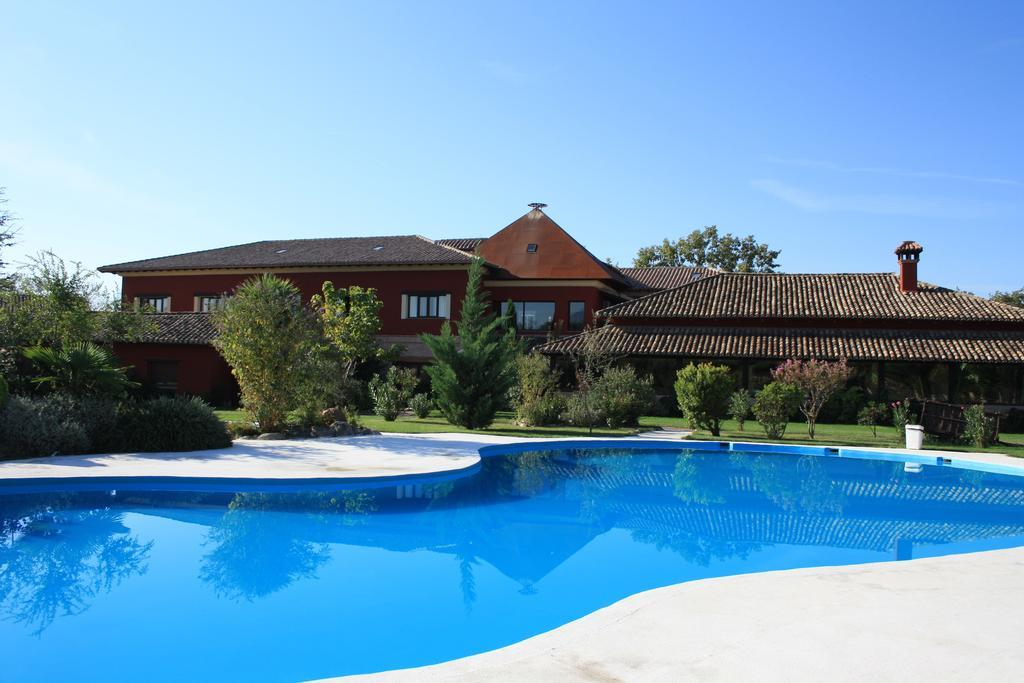 Hotel El Mirlo Blanco Канделеда Экстерьер фото
